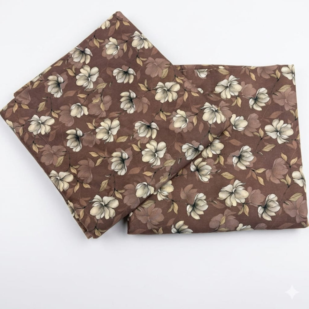 Brown floral fabric with cream flowers and leaves, soft cotton material for home decor or sewing projects
