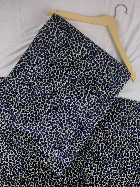 Blue and cream leopard print unstitched lawn fabric on hanger, premium designer material for ladies suits