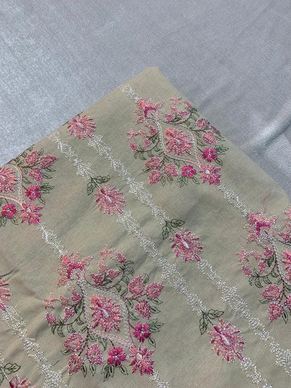 Elegant floral embroidery on premium lawn fabric, perfect for designer ladies suits and unstitched clothing.