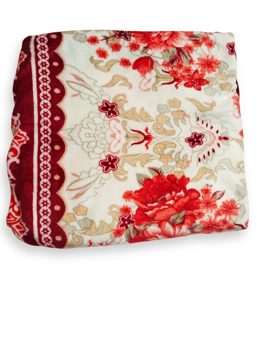 Soft, plush Mughalia Premium AC Blanket draped over a sofa, showcasing its cozy, high-quality fabric and elegant design.