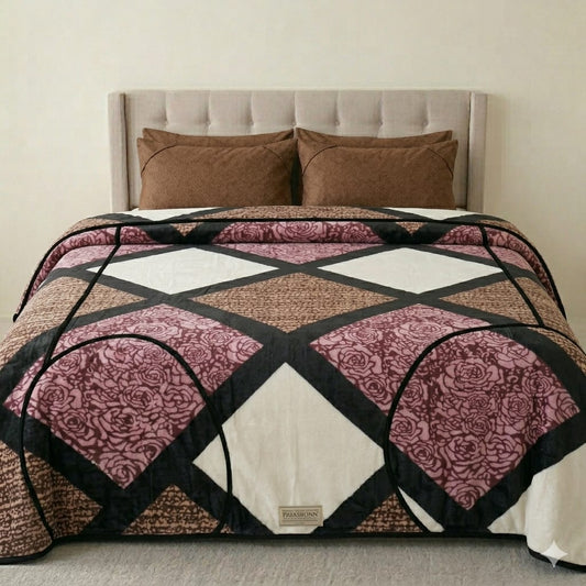 Luxury Mughalia all-season AC fleece blanket spread out on a bed, showcasing soft, plush fabric and elegant design.