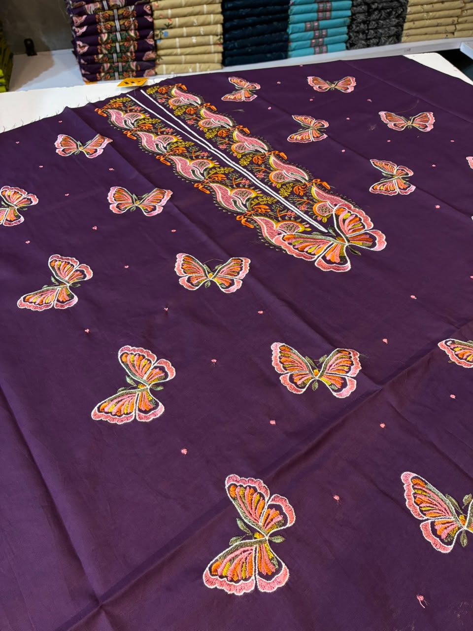 Mughalia Premium Unstitched 2-piece fabric set featuring intricate traditional Mughal-inspired patterns on high-quality material.