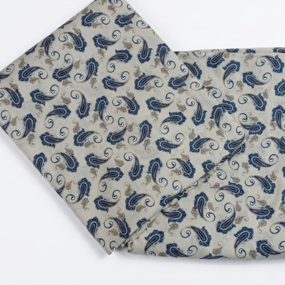 Blue and beige paisley patterned fabric, soft cotton textile for home decor or apparel